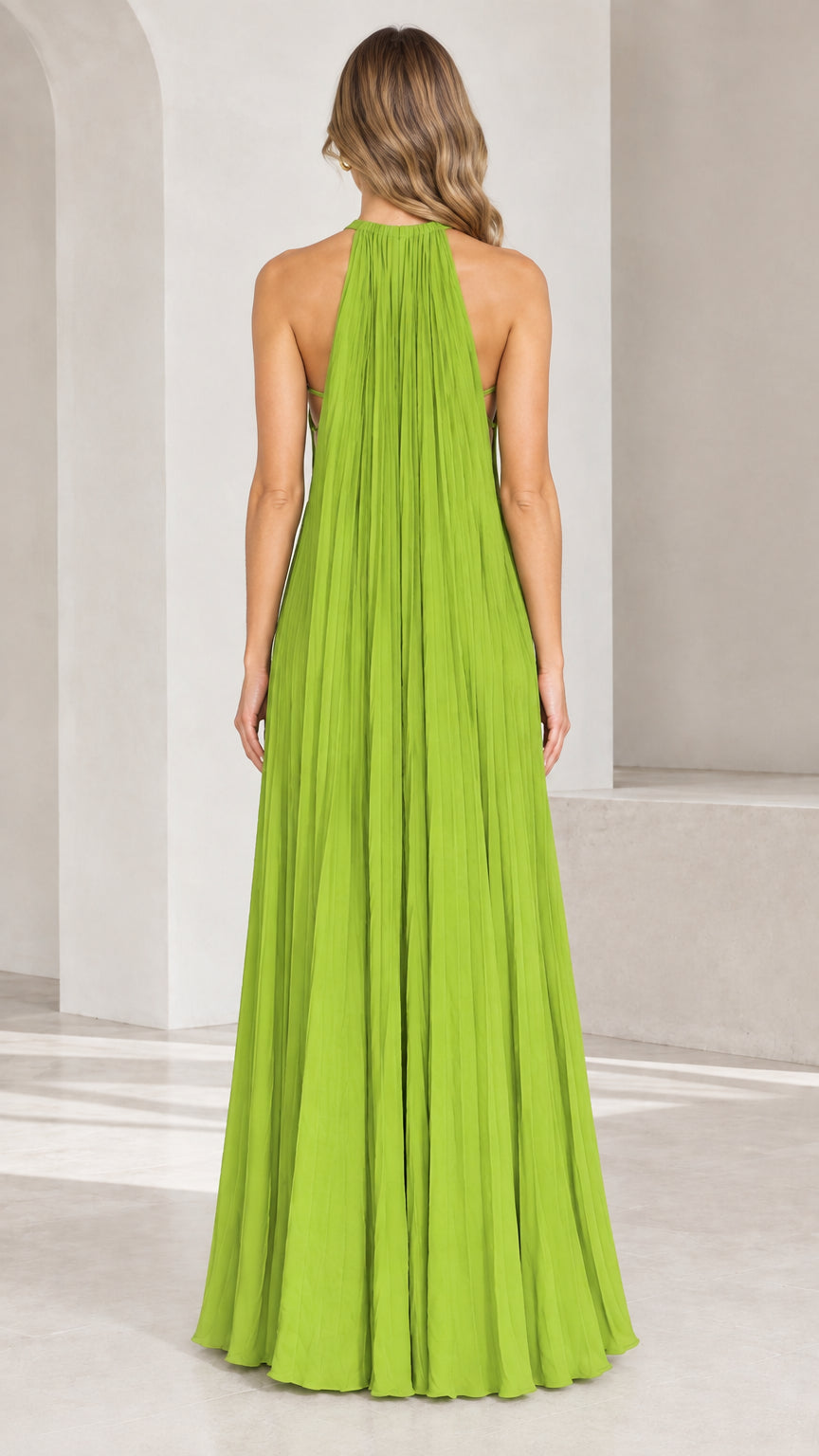 Back view of Lime Green pleated halter maxi dress showcasing open back and pleats