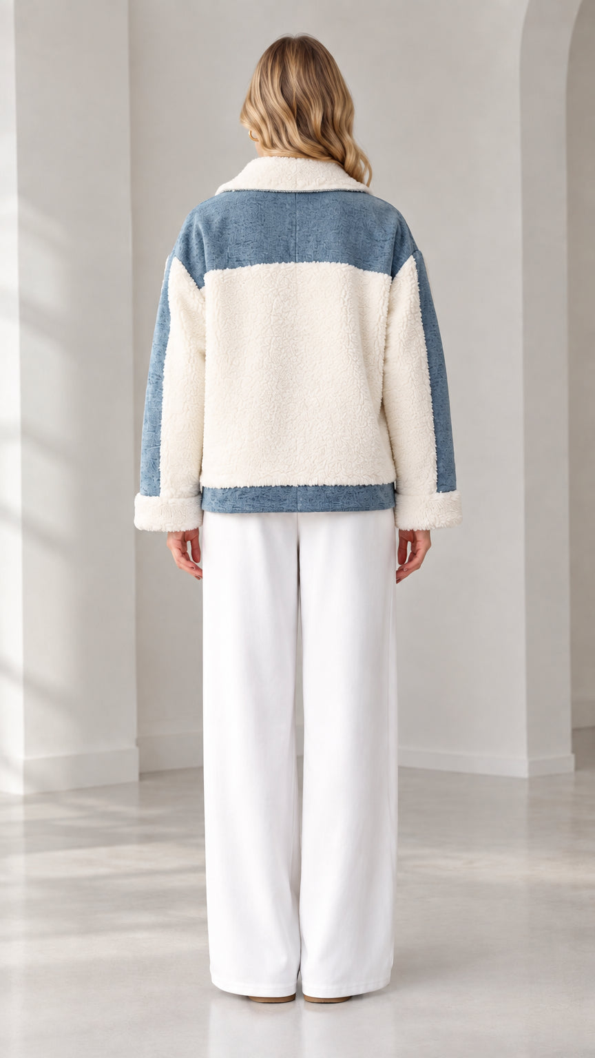 Back view of blue denim and cream colorblock sherpa fleece jacket