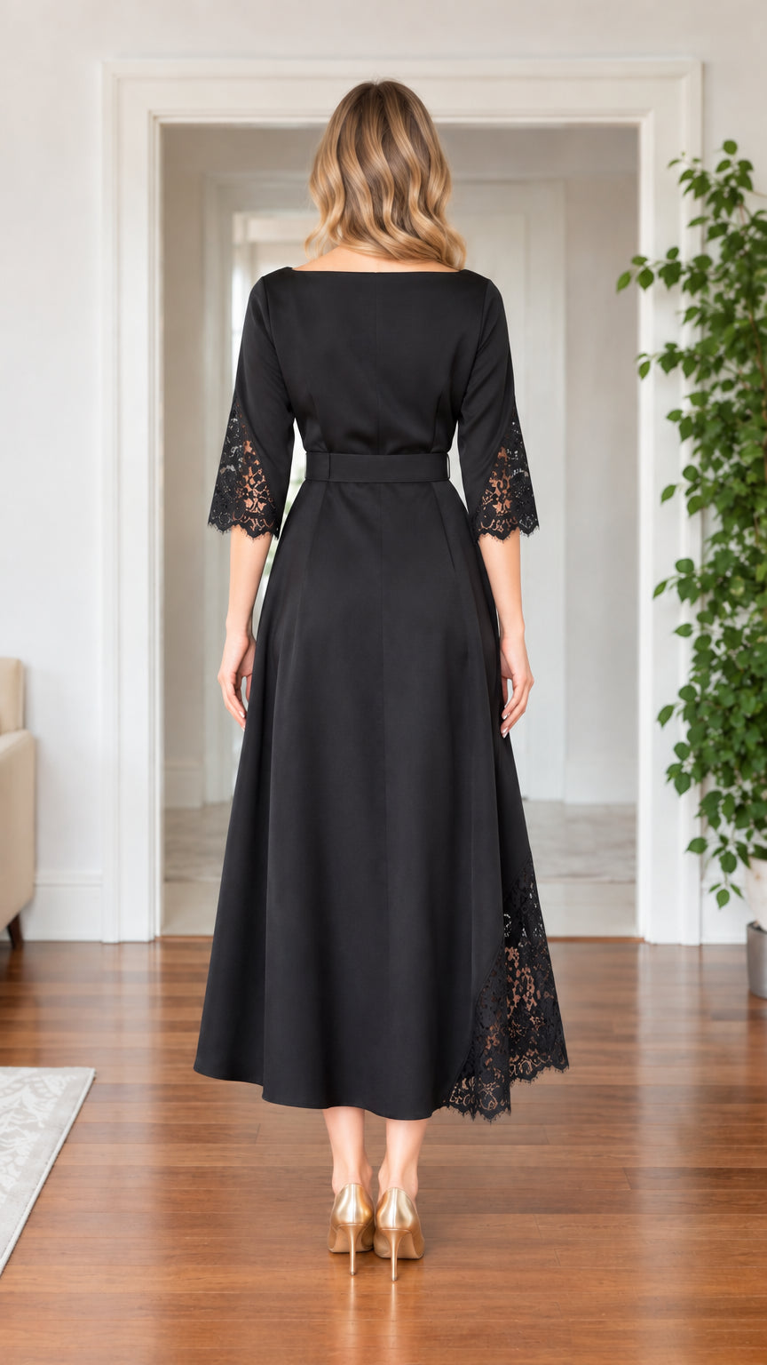 Back view of woman wearing black boat neck belted A-line midi dress