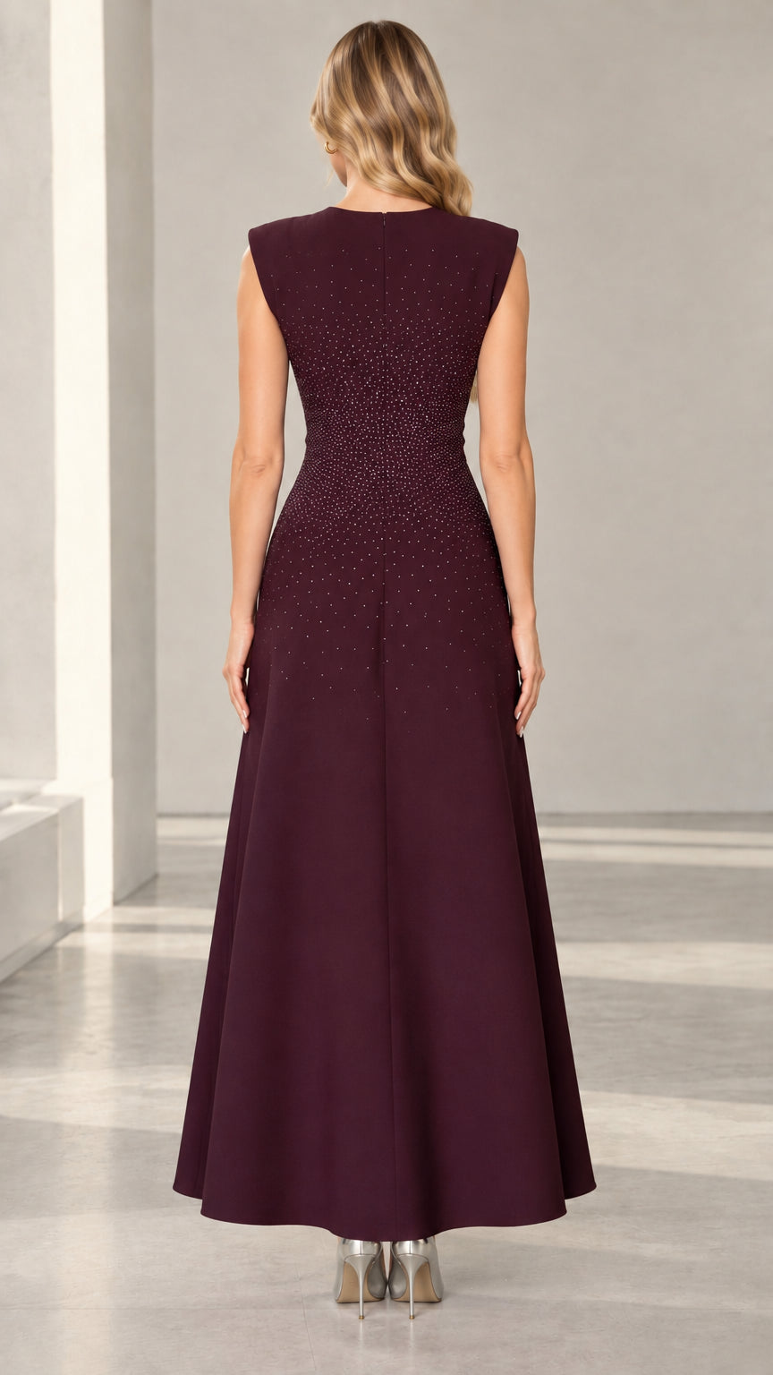 Burgundy formal evening gown back view showing tailored fit