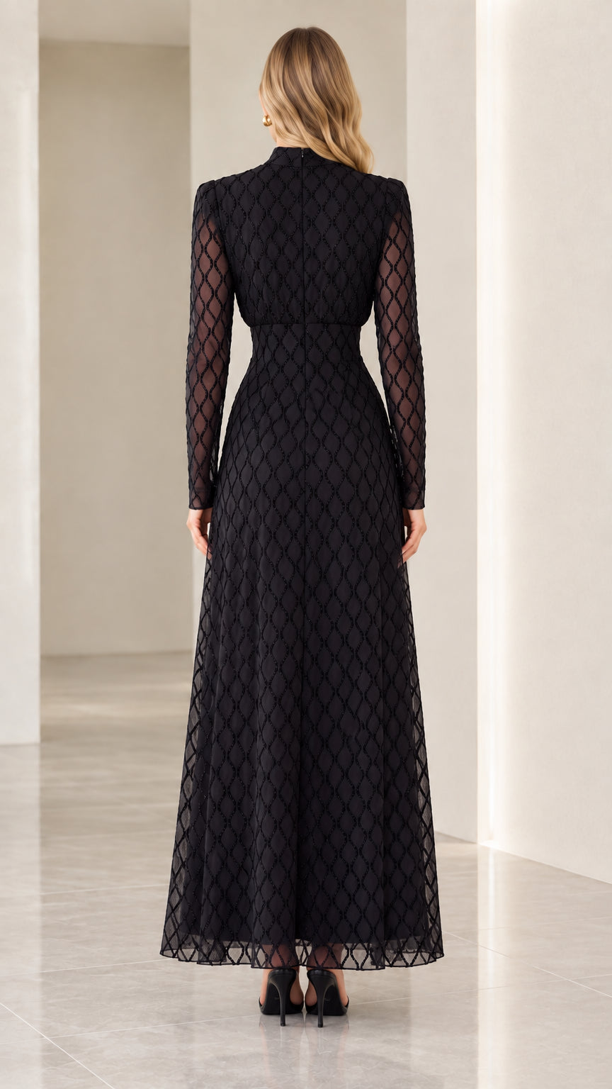 Back view of woman wearing black long sleeve high neck maxi evening dress
