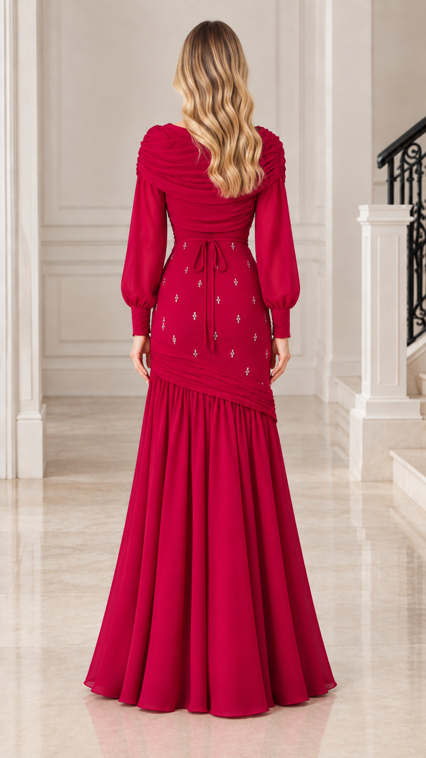 Back view of model wearing Raspberry long sleeve evening gown with back waist tie detail