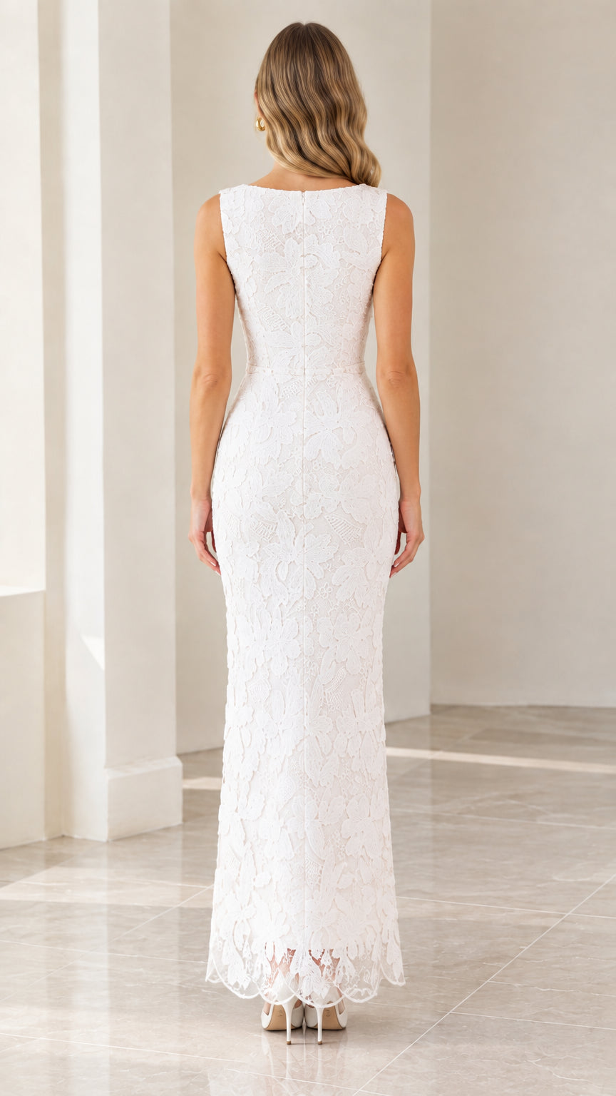Back view of woman wearing white sleeveless floral lace maxi evening gown
