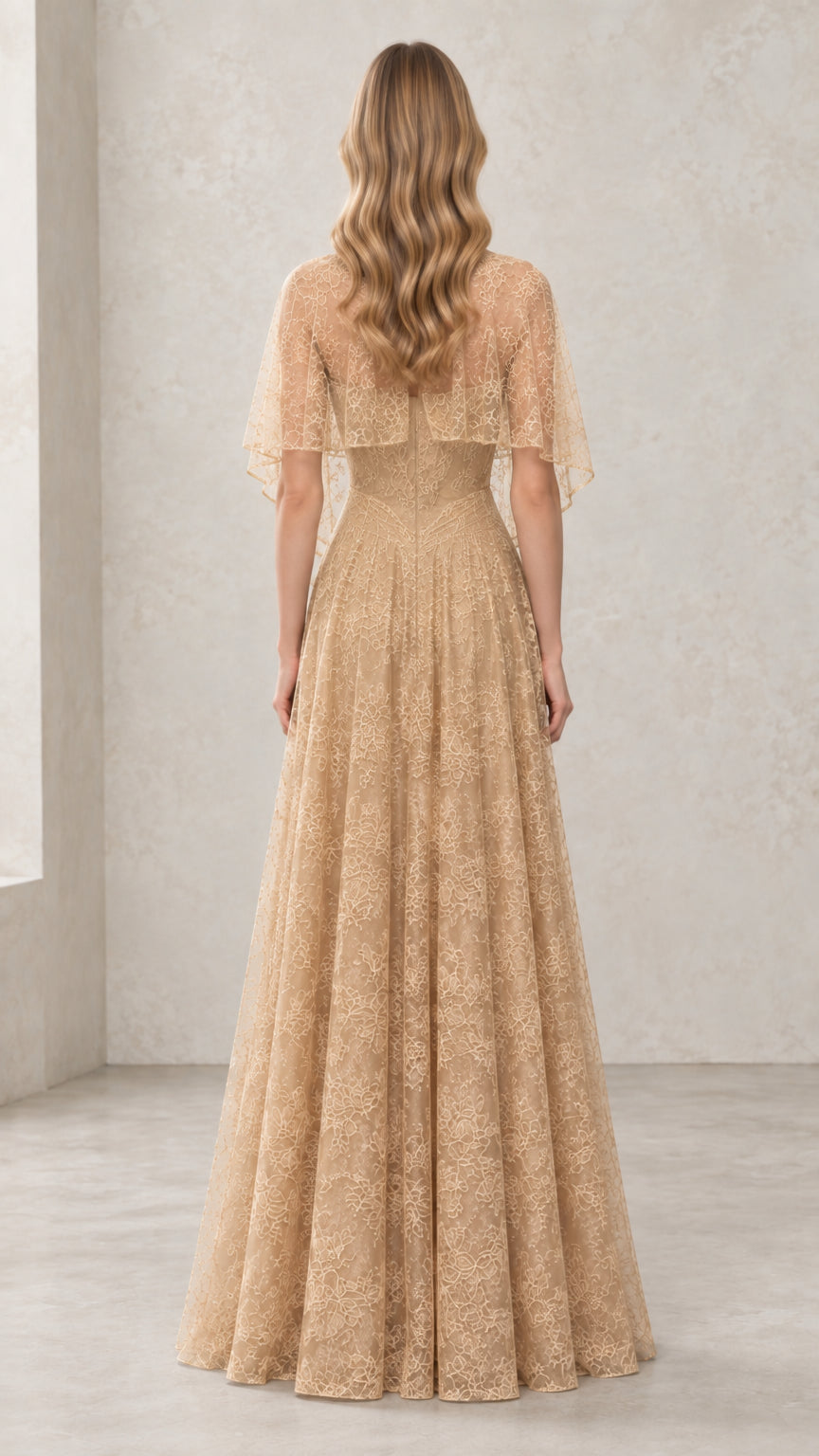 Back view of woman wearing Champagne A-line lace formal gown with cape overlay