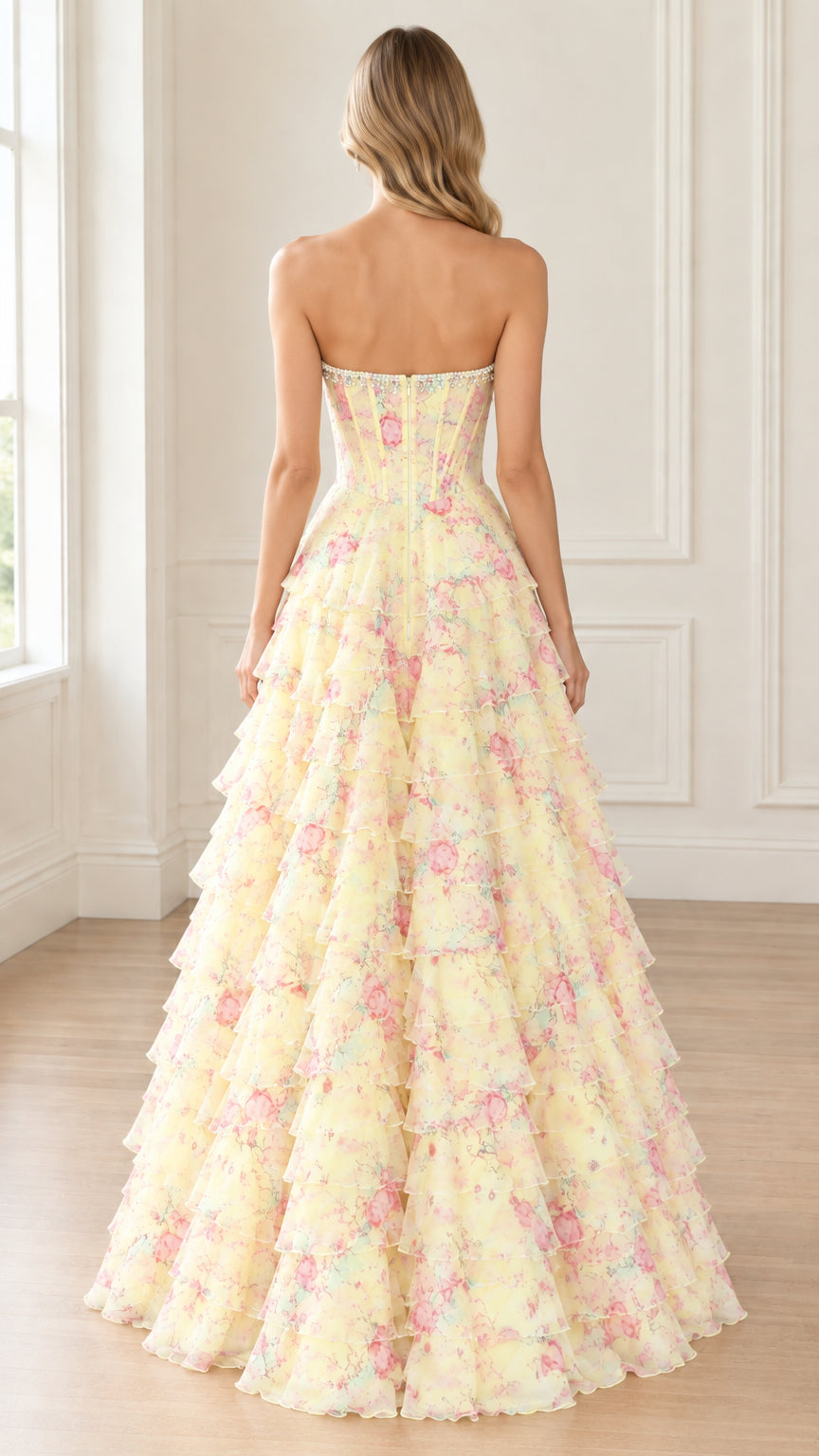Back view of yellow floral strapless gown showcasing corset back closure