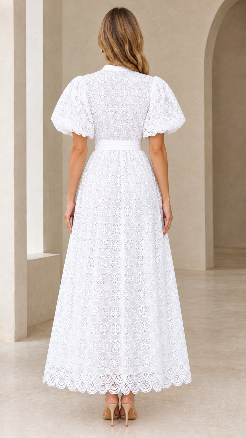 Back view of model wearing white puff sleeve lace maxi dress