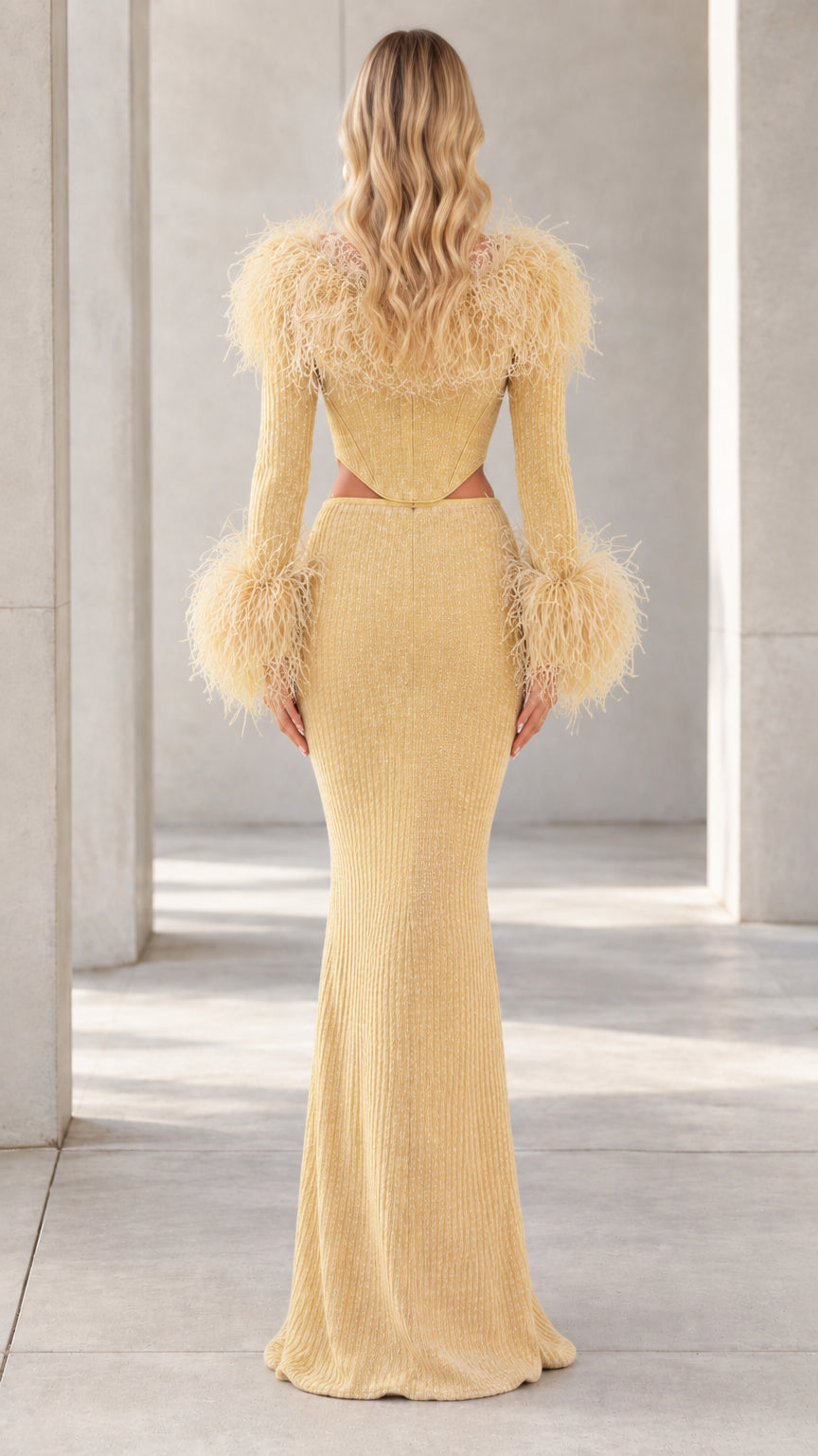 Back view of model wearing Champagne Gold cutout maxi dress