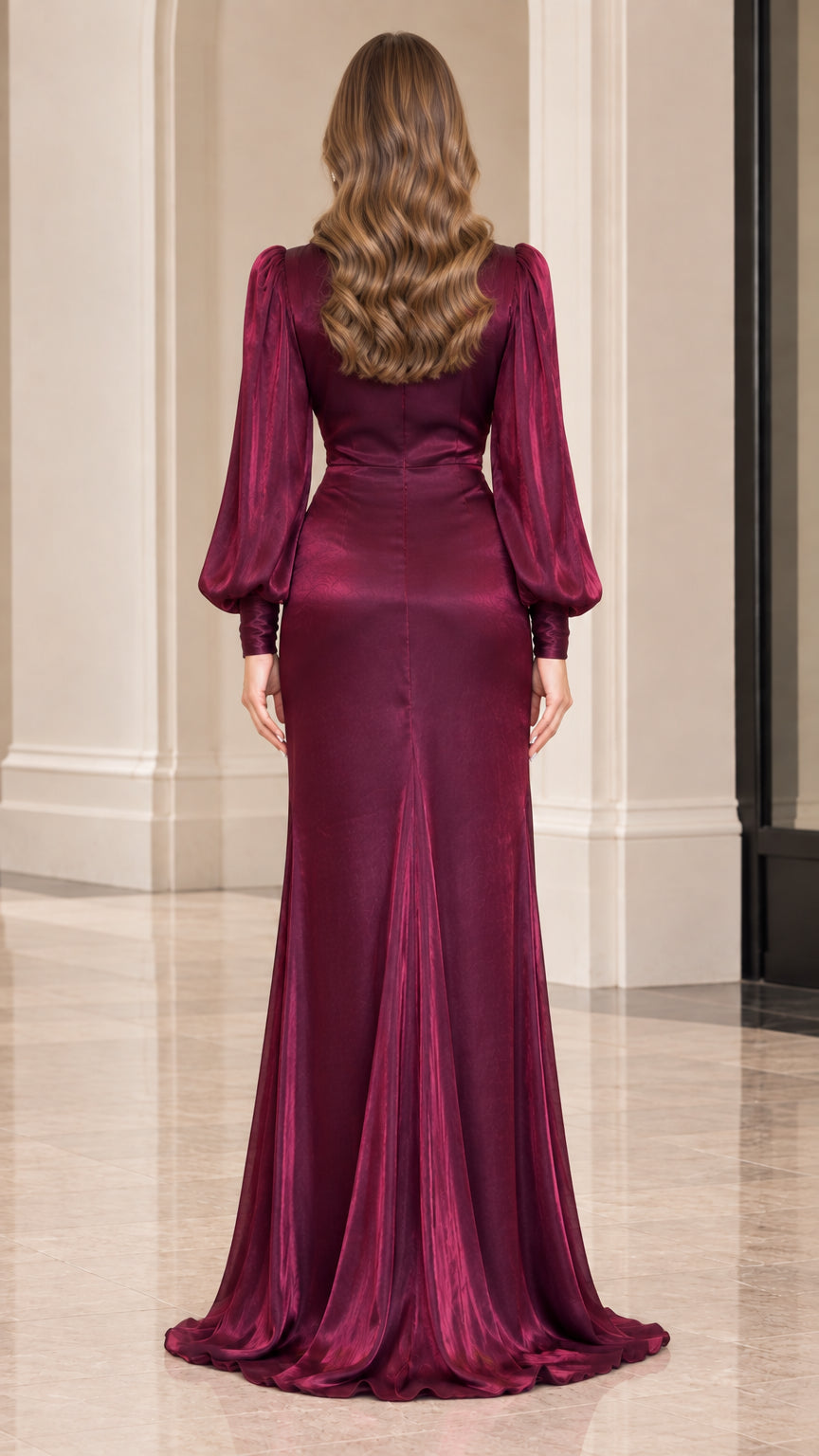 Back view of model wearing burgundy evening gown showing smooth fitted silhouette