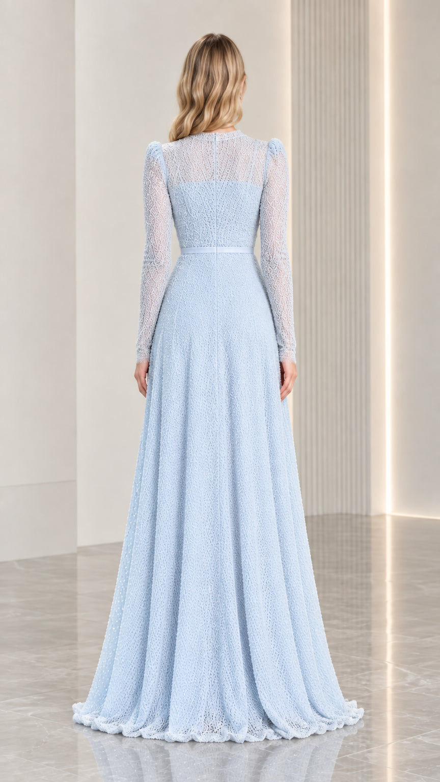 Back view of light blue floor-length illusion gown