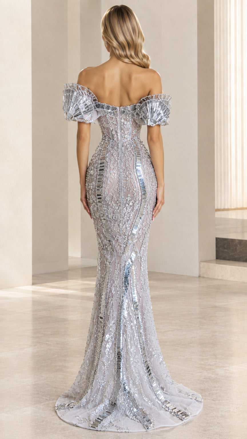Back view of model in silver sequin off-the-shoulder evening gown
