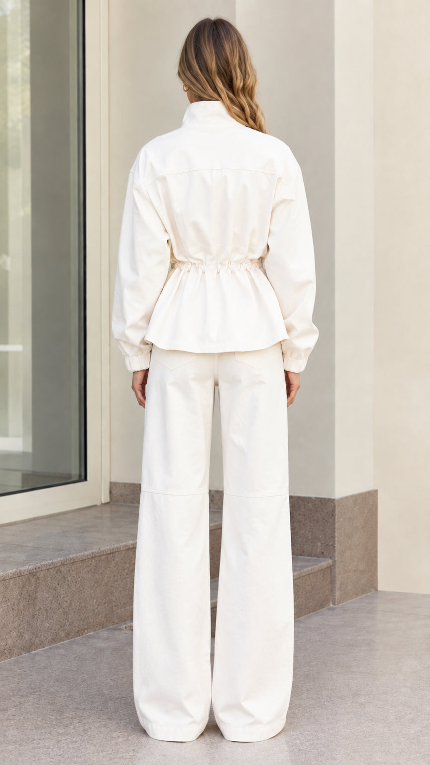 Back view of women's off white utility set showing drawstring waist