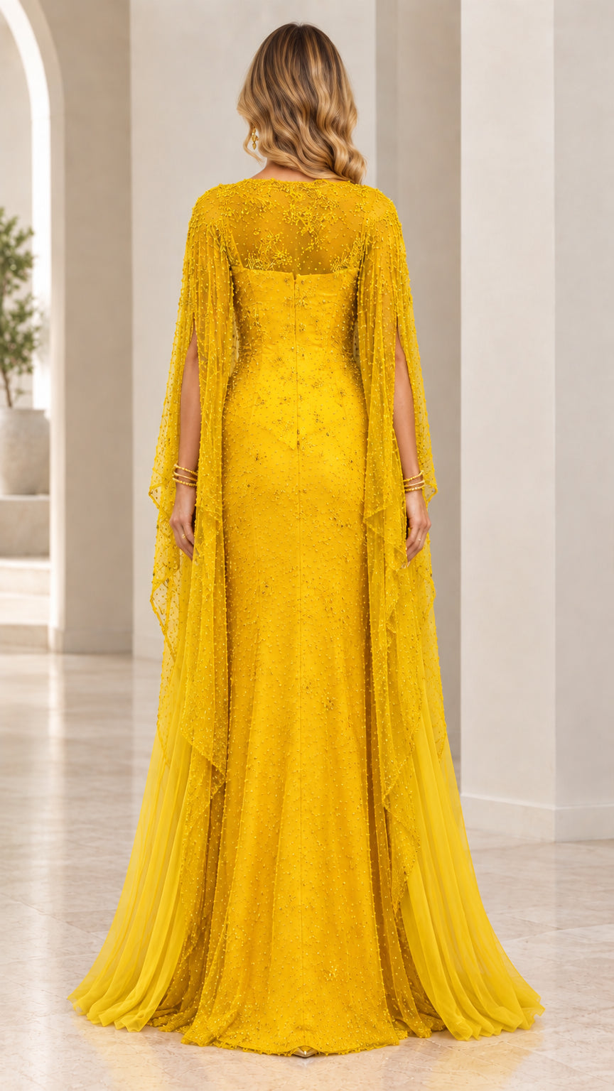 Back view of Mustard Yellow beaded evening dress with full-length cape overlay