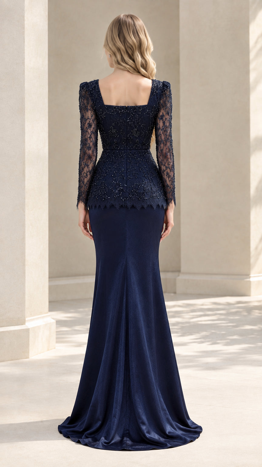 Back view of Navy Blue square back beaded lace evening gown with flowing trumpet skirt