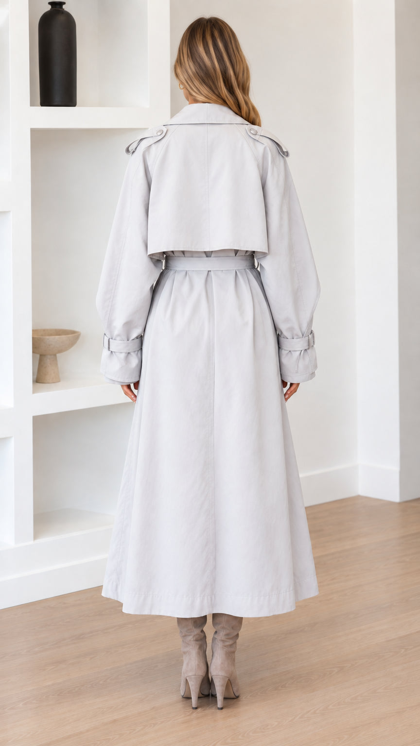 Back view of Light Grey maxi trench coat showing back storm flap and belt