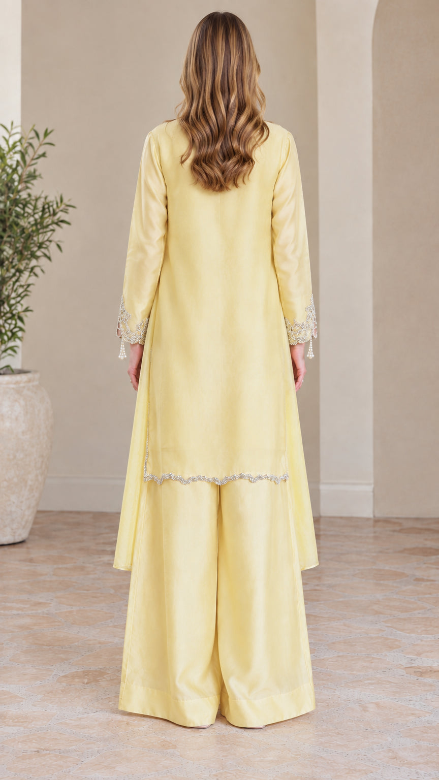 Back view of pale yellow satin long tunic and wide leg pants set