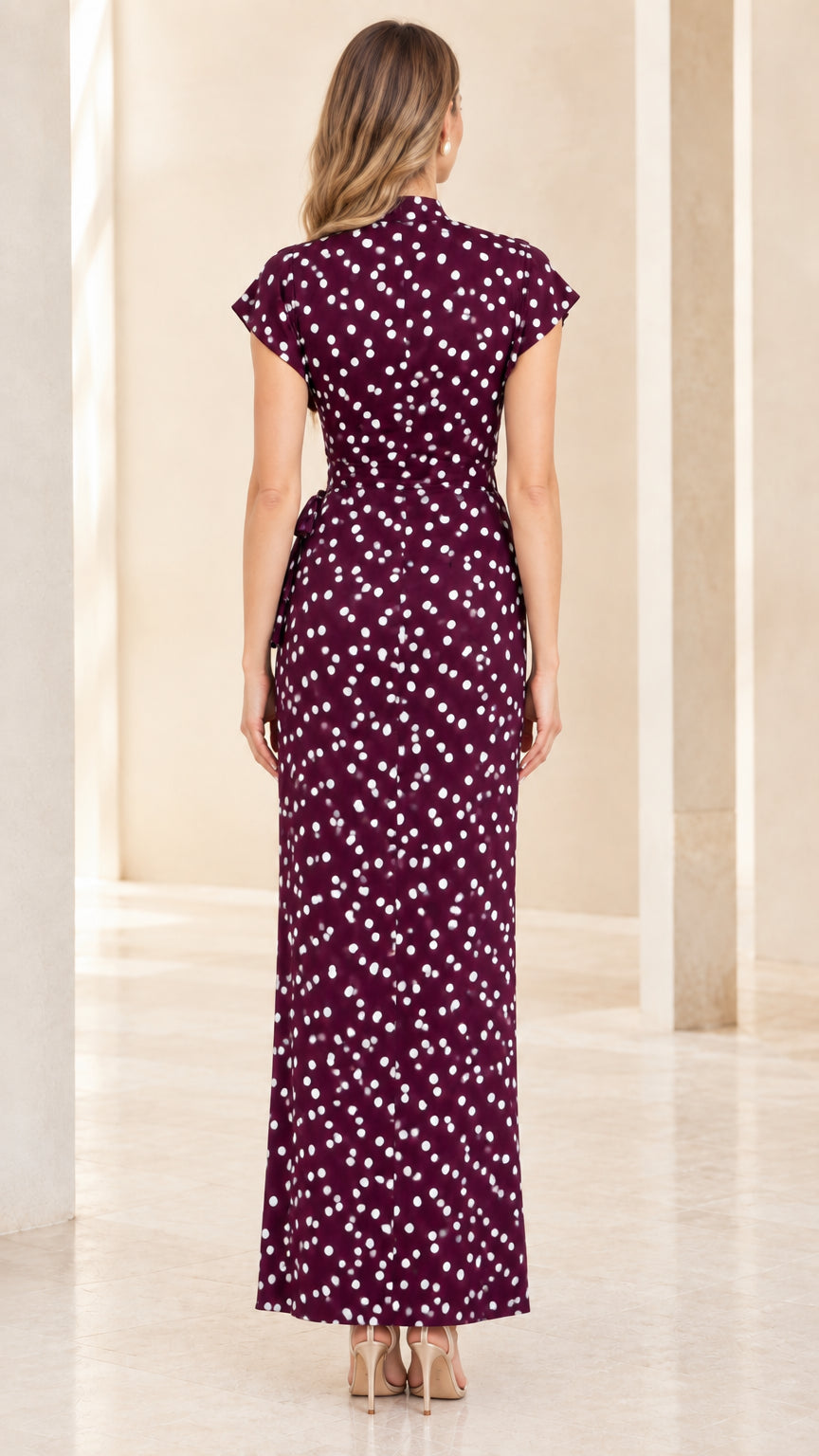 Back view of Burgundy polka dot maxi dress with cap sleeves