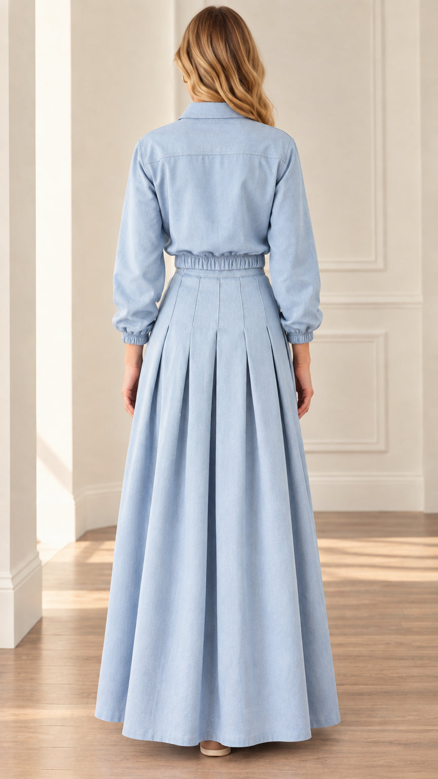 Back view of women's sky blue pleated long skirt and button-up shirt set