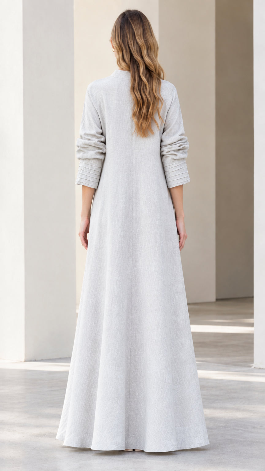 Back view of light grey modest mock neck maxi dress showing clean line and zip
