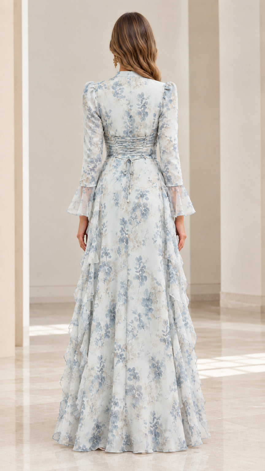 Back view of dusty blue floral tiered maxi dress showing waist gathering