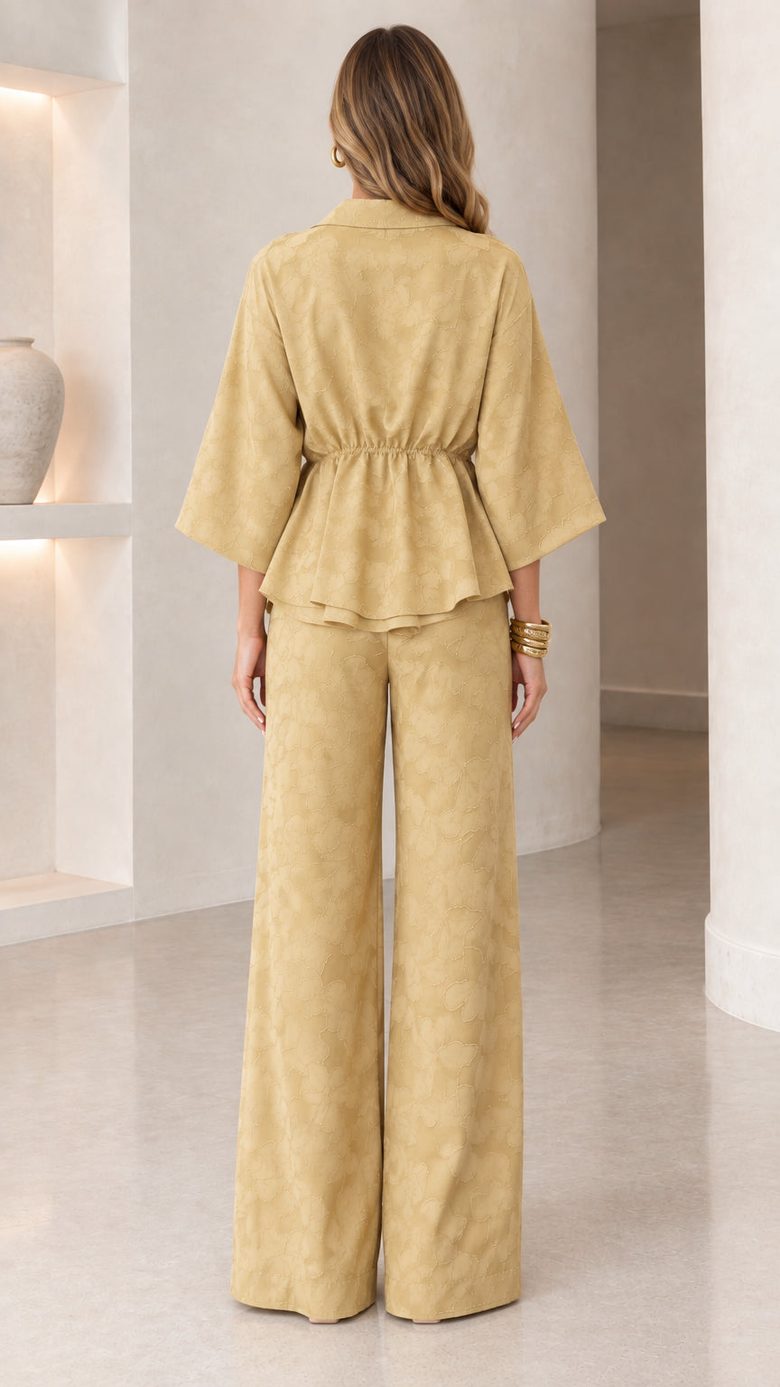 Back view of mustard two-piece matching set showing relaxed fit and drape