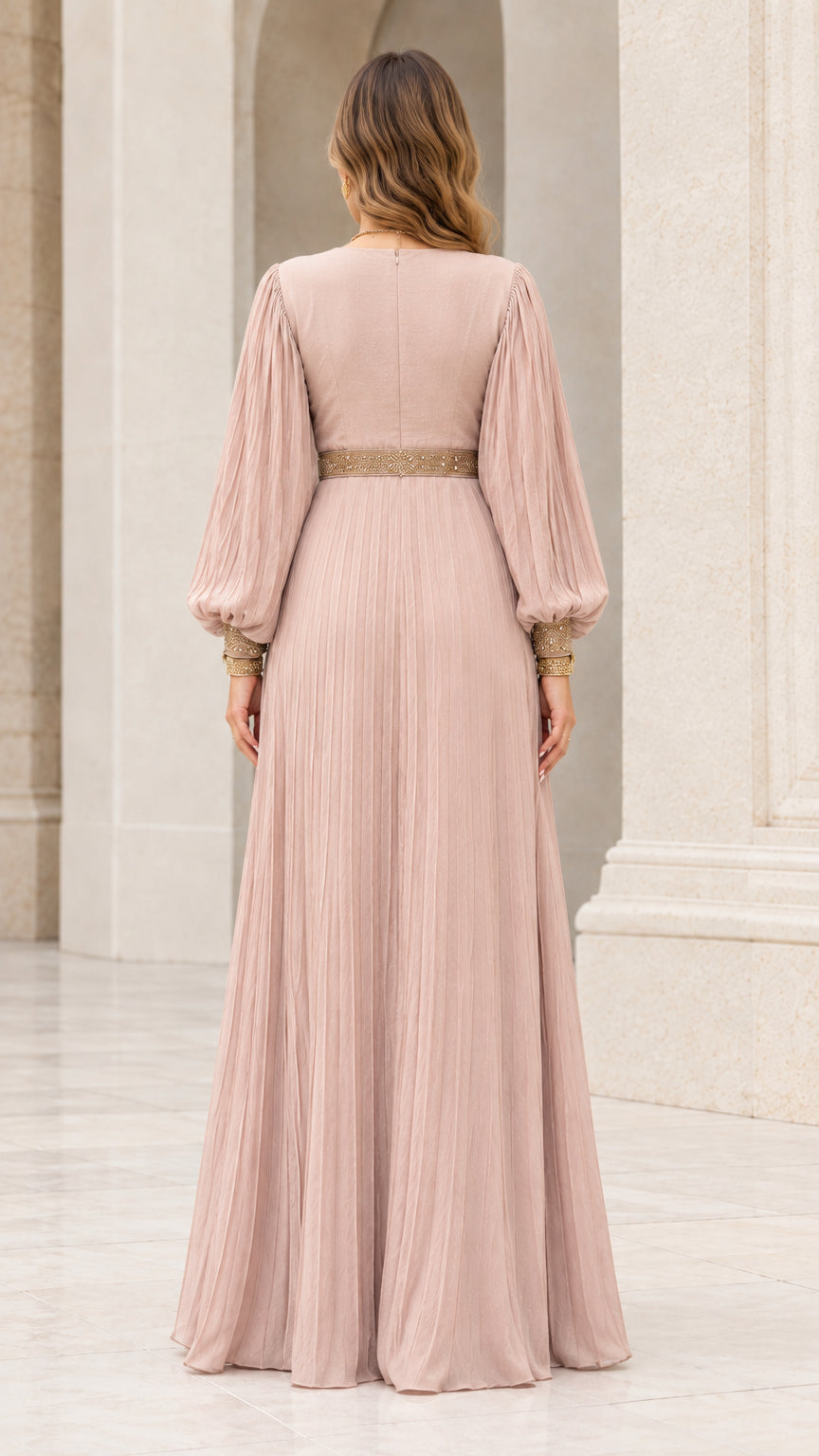 Back view of model in floor-length dusty rose pleated maxi dress