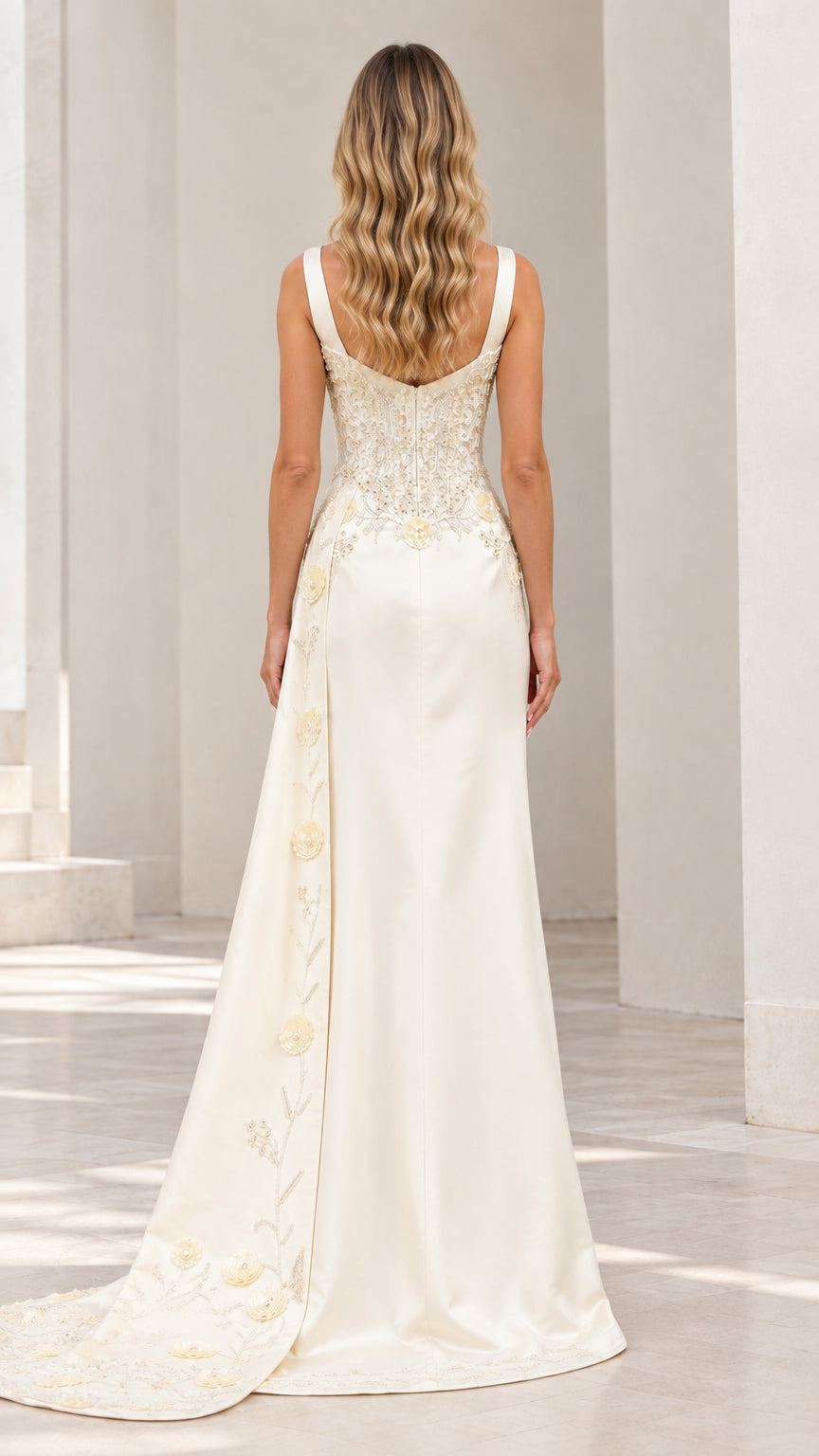 Back view of ivory satin corset evening dress showing train detail