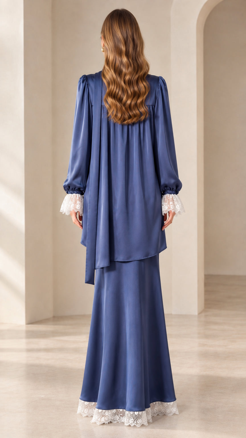 Back view of woman wearing Dusty Blue long-sleeve satin maxi set with gathered yoke