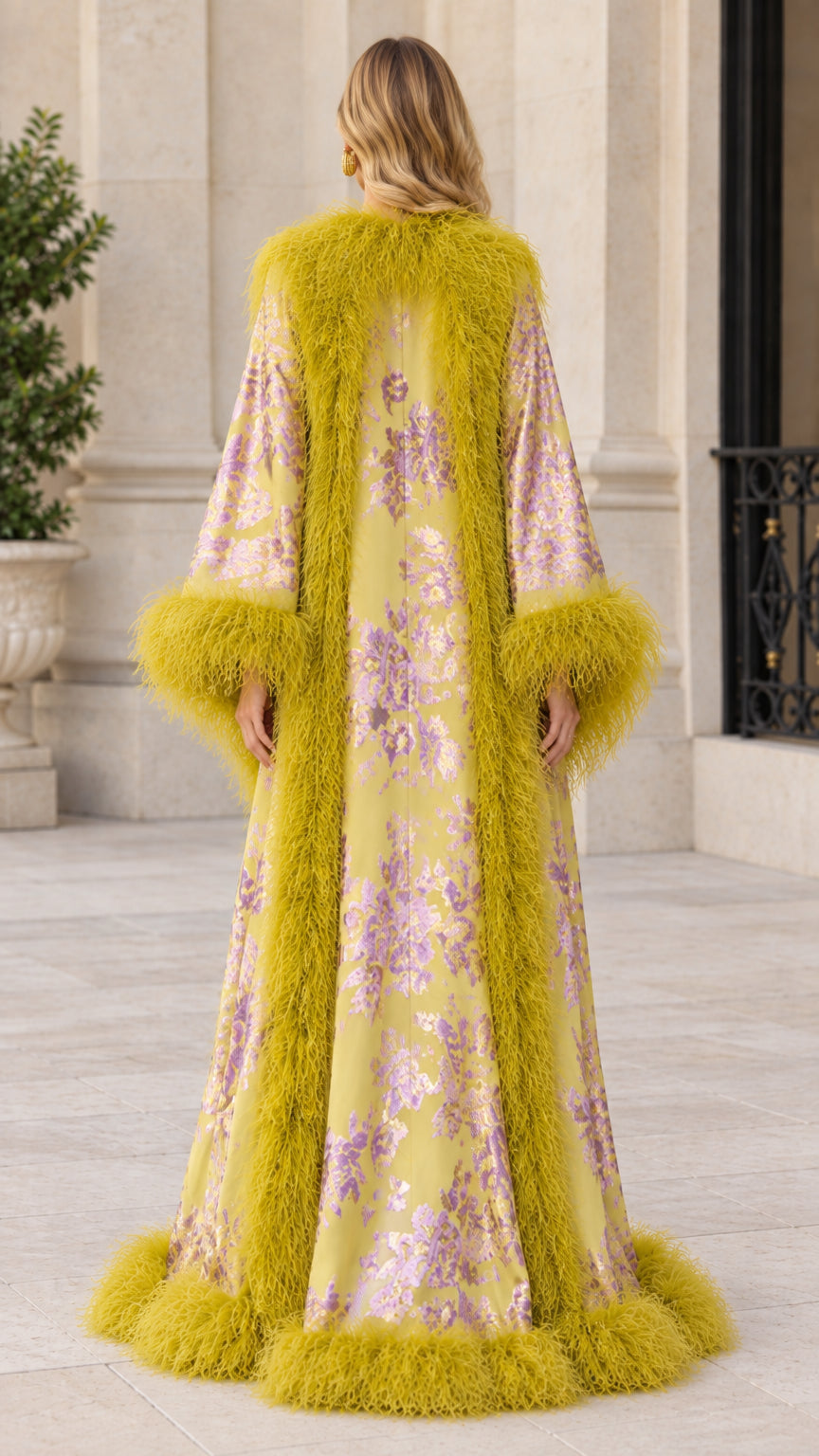 Back view of floor-length chartreuse floral jacquard robe with feather trim details