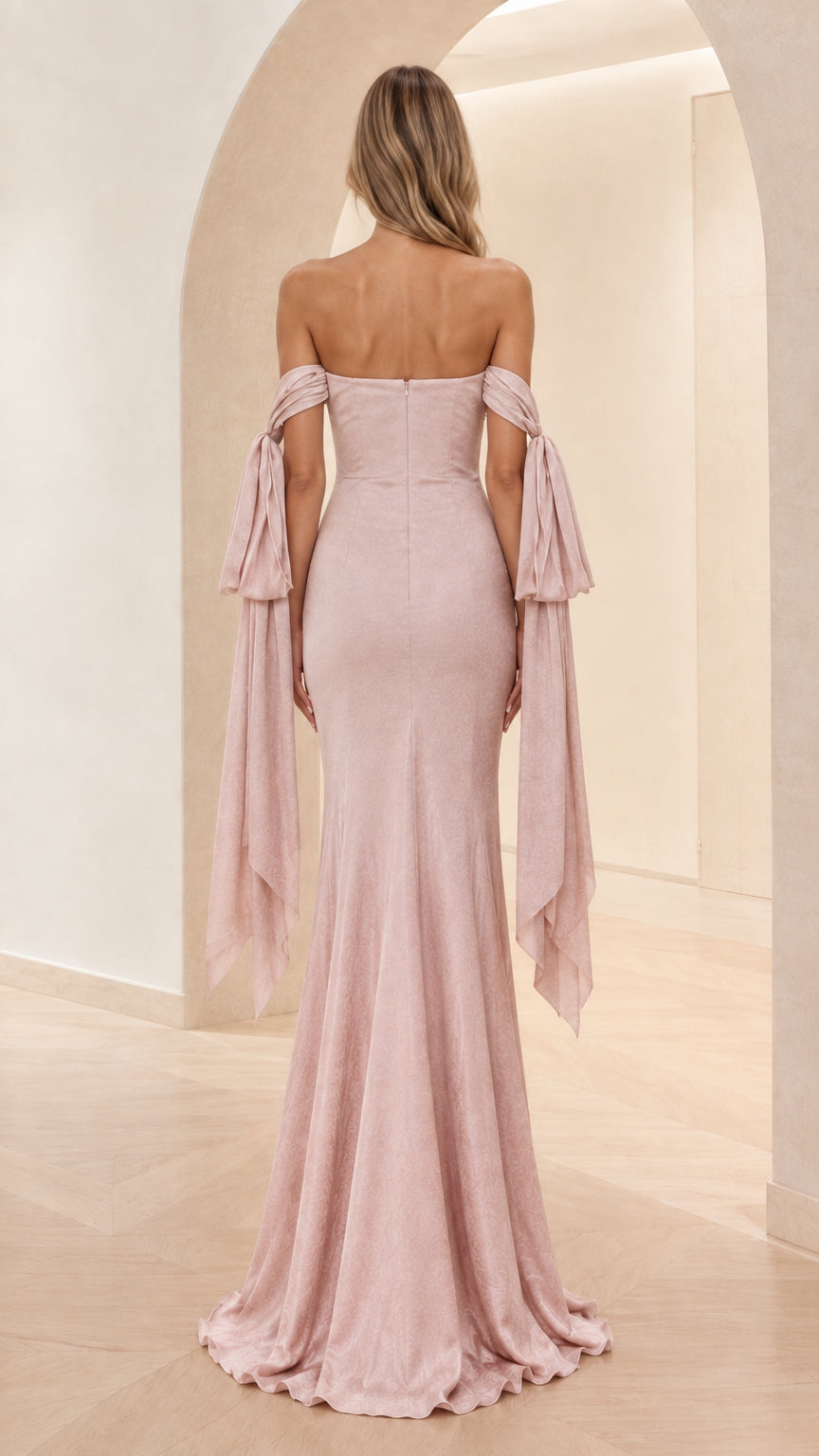 Dusty pink mermaid evening gown back view showing fitted silhouette