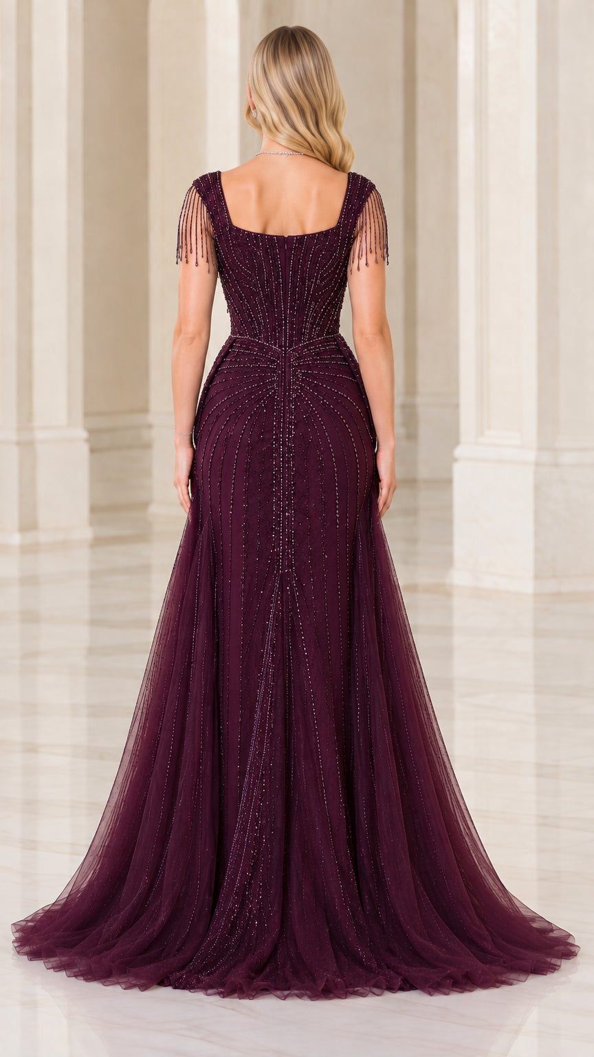 Back view of burgundy beaded formal dress with square back and cascading tulle skirt