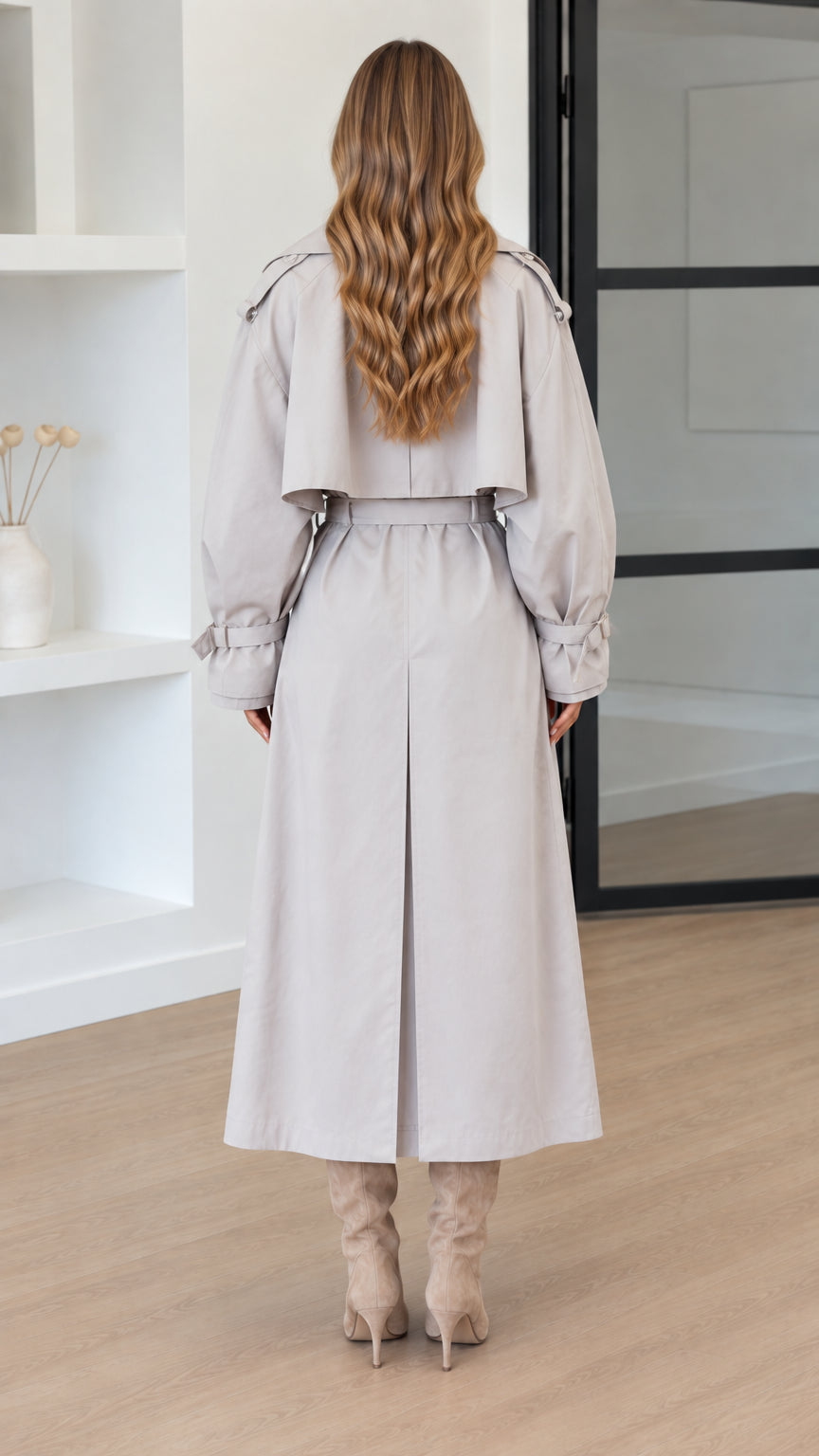 Back view of Light Grey maxi trench coat showing back storm flap and center vent