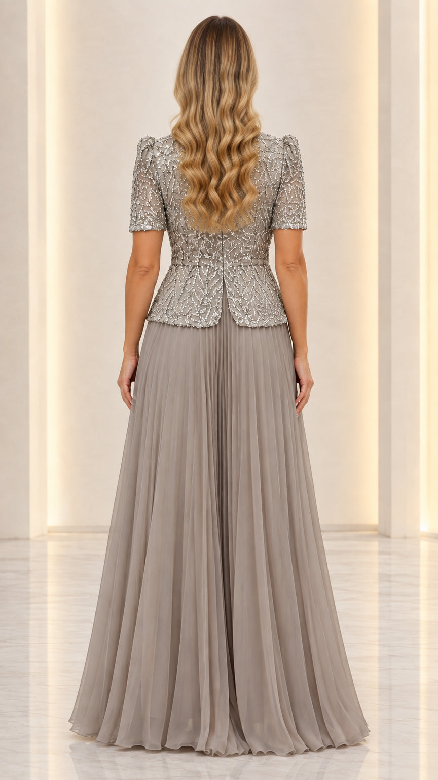 Back view of slate grey sequin evening dress with pleated maxi skirt