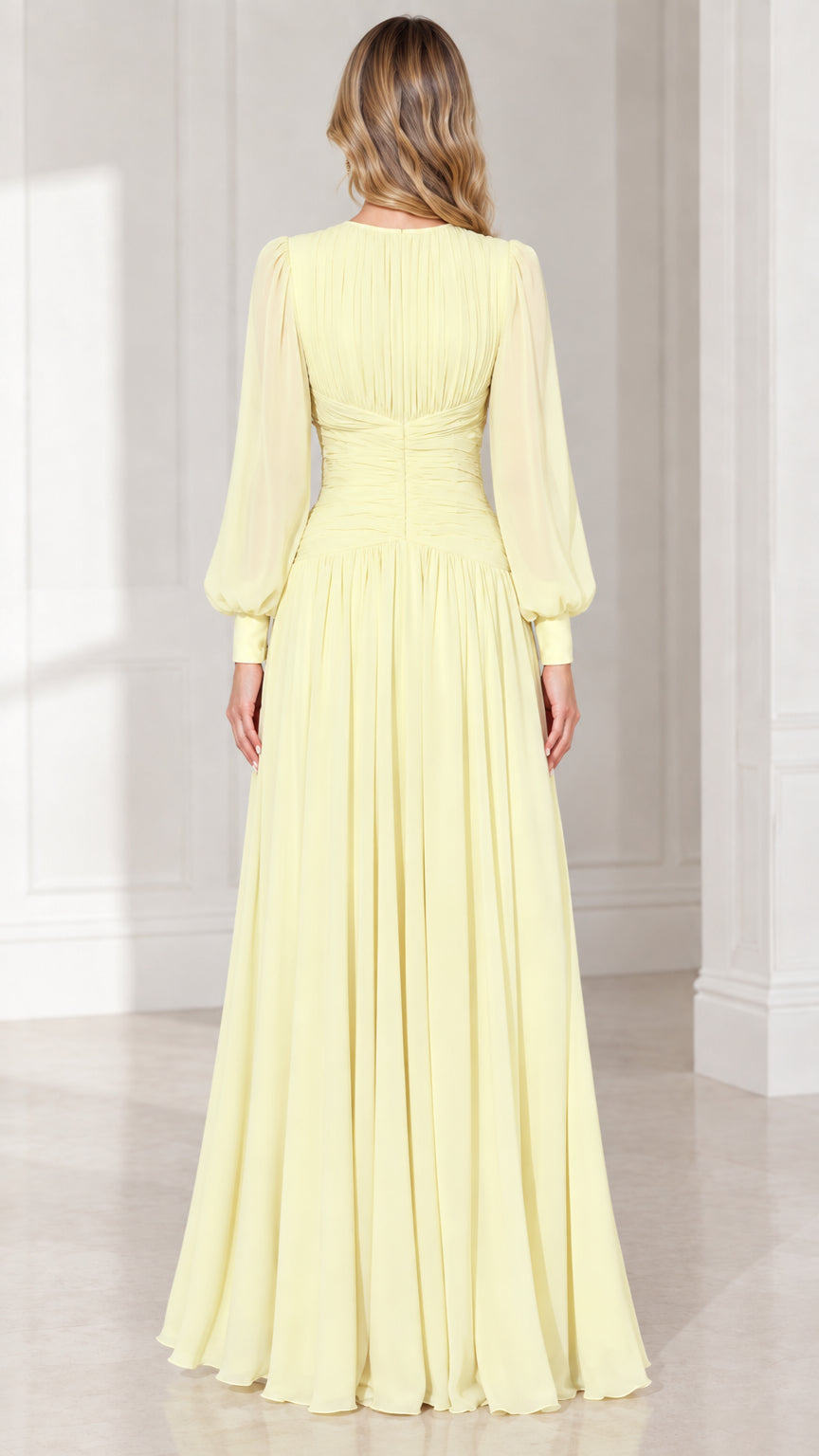 Back view of pale yellow long sleeve chiffon maxi gown