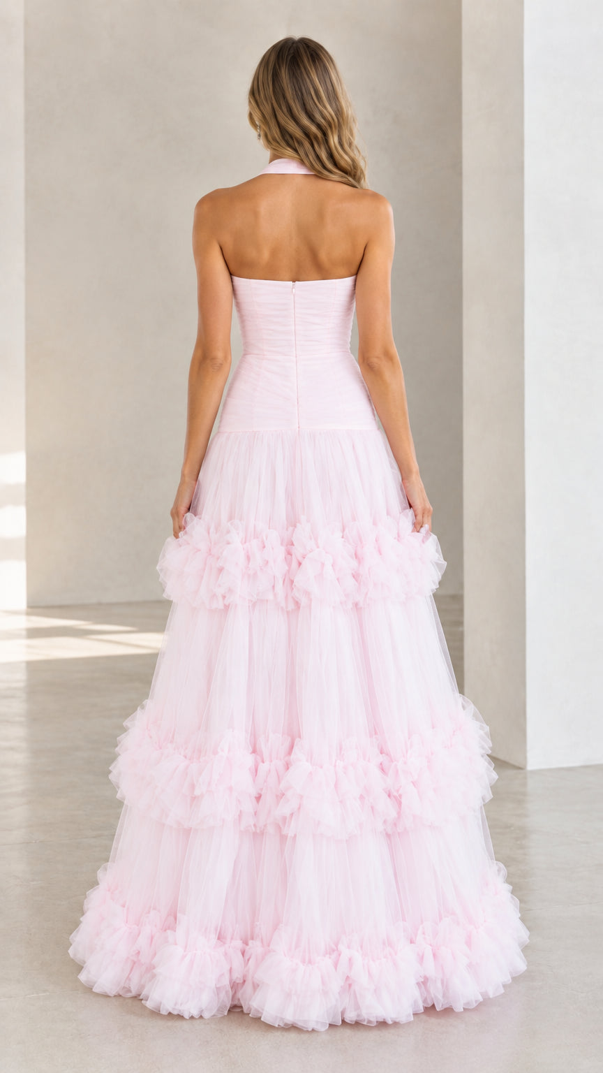 Back view of Light Pink halter neck open back tiered tulle formal dress
