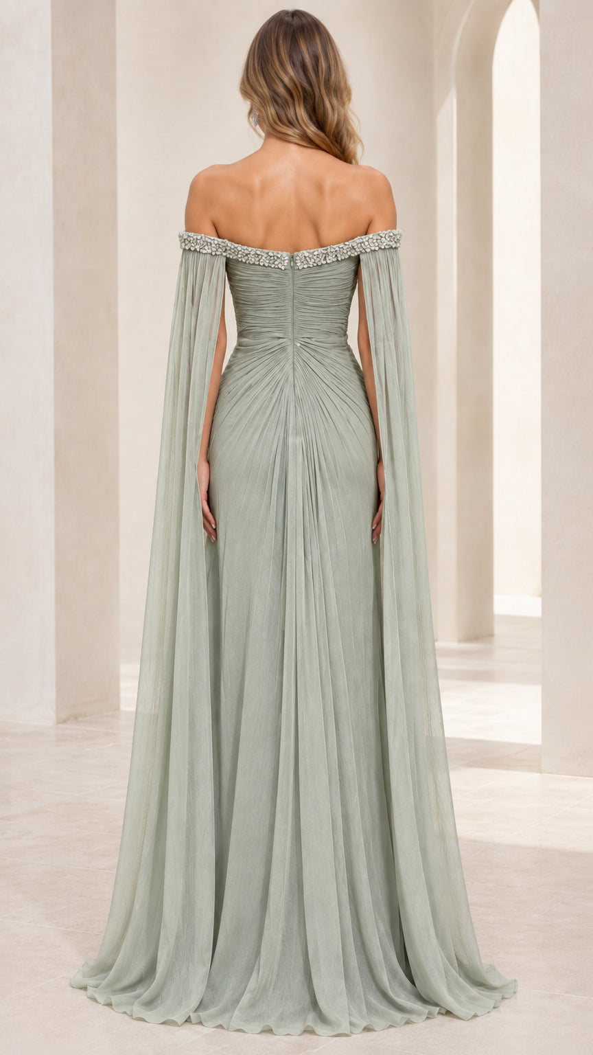 Sage Green ruched back evening gown with dramatic cape sleeves - back view