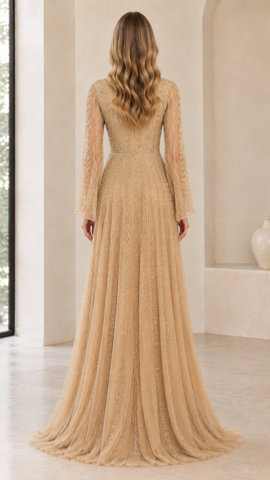 Back view of model showing floor length champagne sequin evening gown