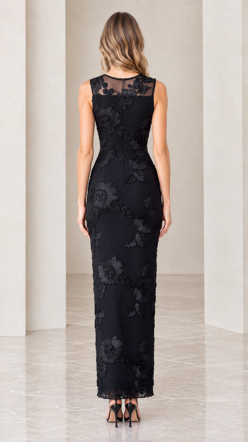 Back view of model showing sheer illusion mesh back and floral embroidery