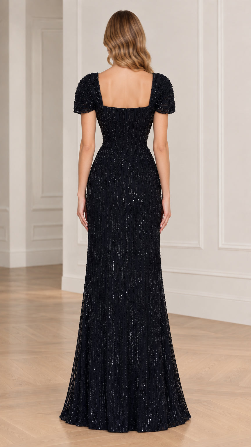 Back view of black sequin formal gown featuring square back neckline