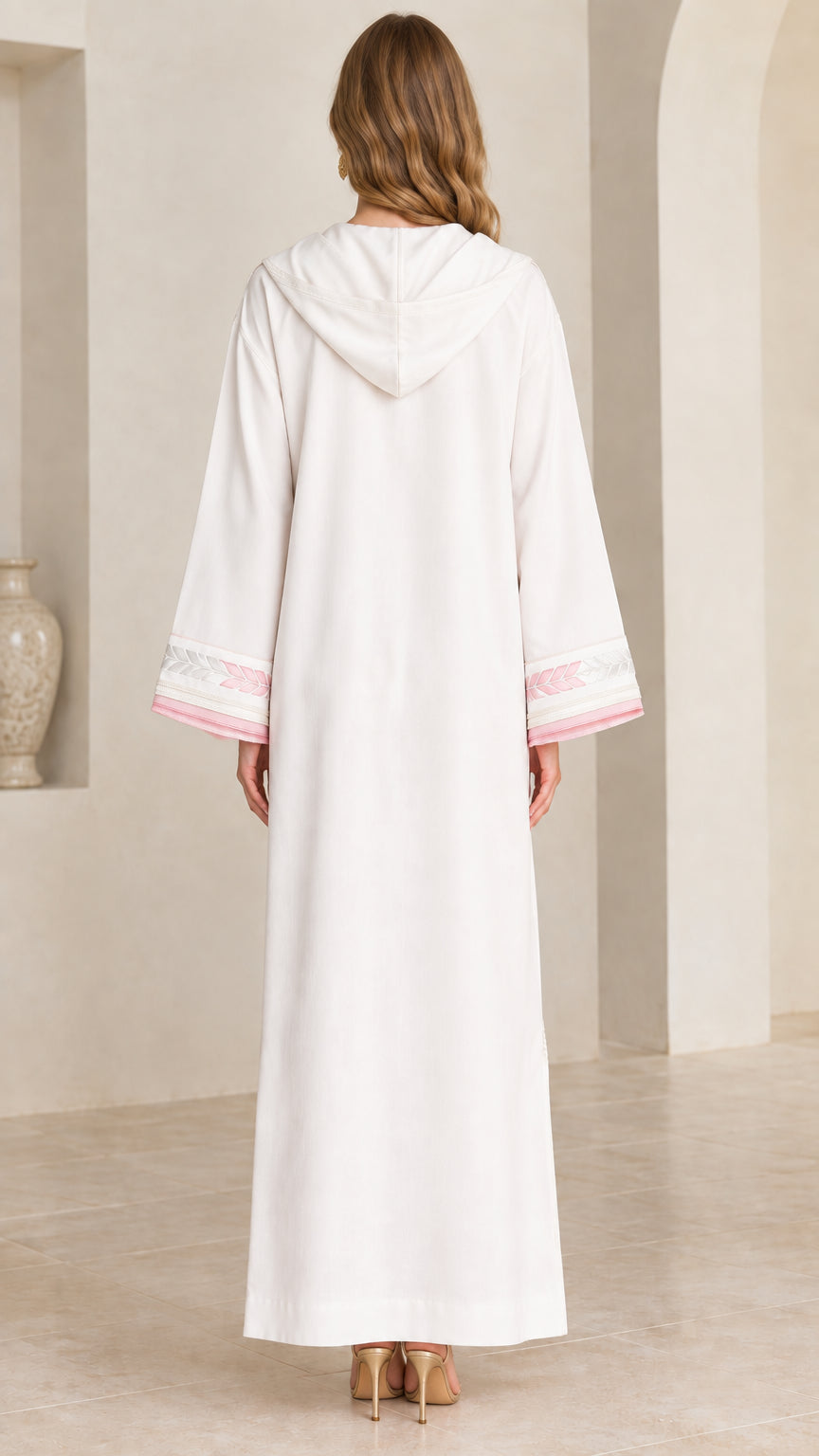 Back view of women's white hooded modest maxi dress showing hood detail