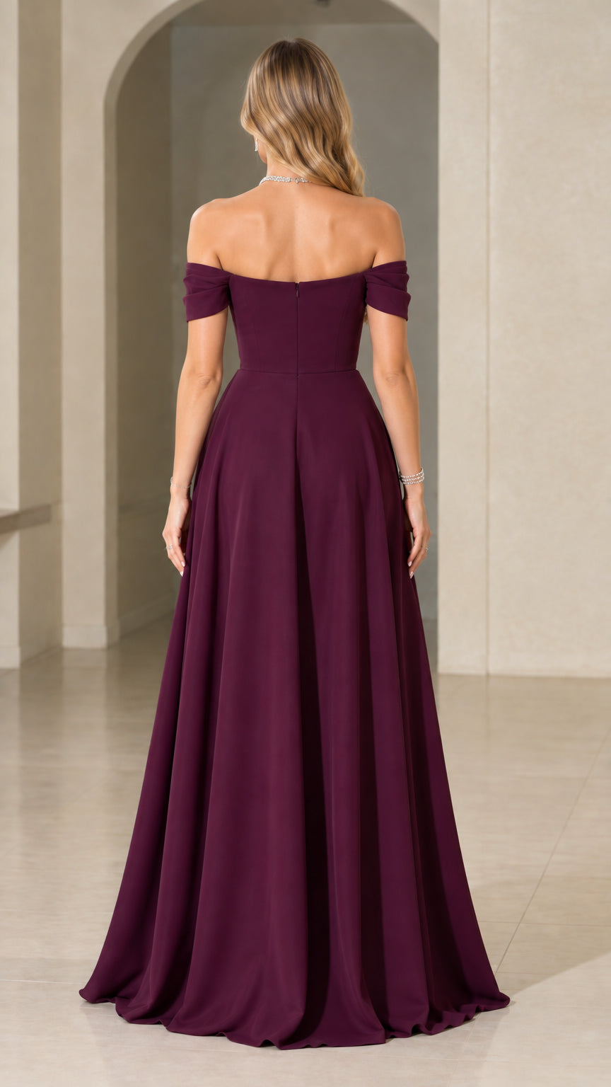 Back view of model in burgundy floor-length off-the-shoulder gown