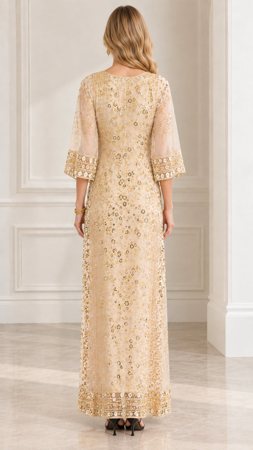 Back view of model wearing Champagne gold sequined floor-length dress