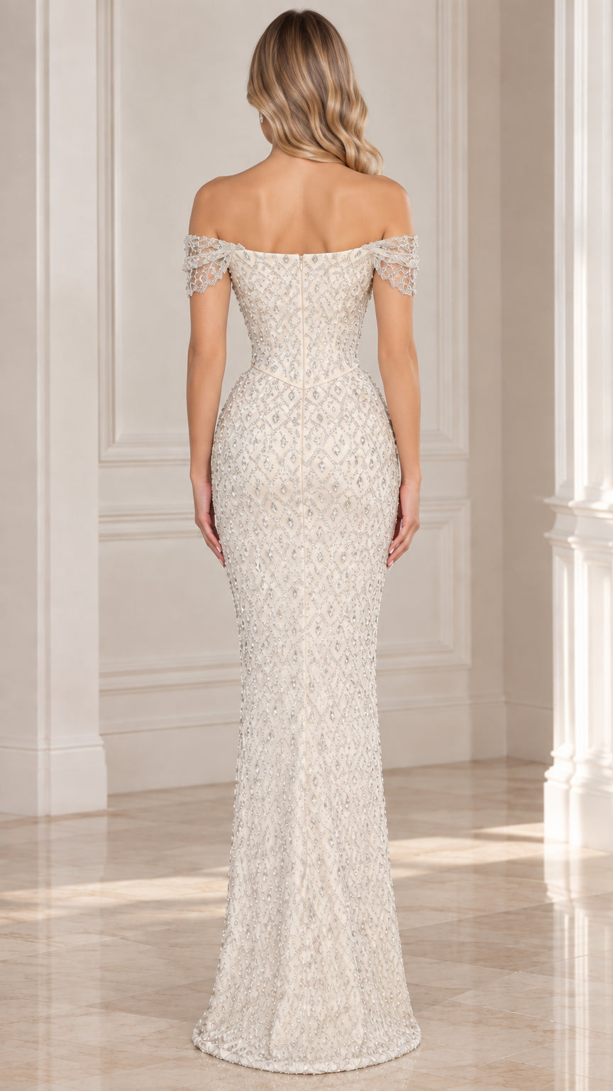 Back view of model in ivory floor-length embellished evening dress with zip closure