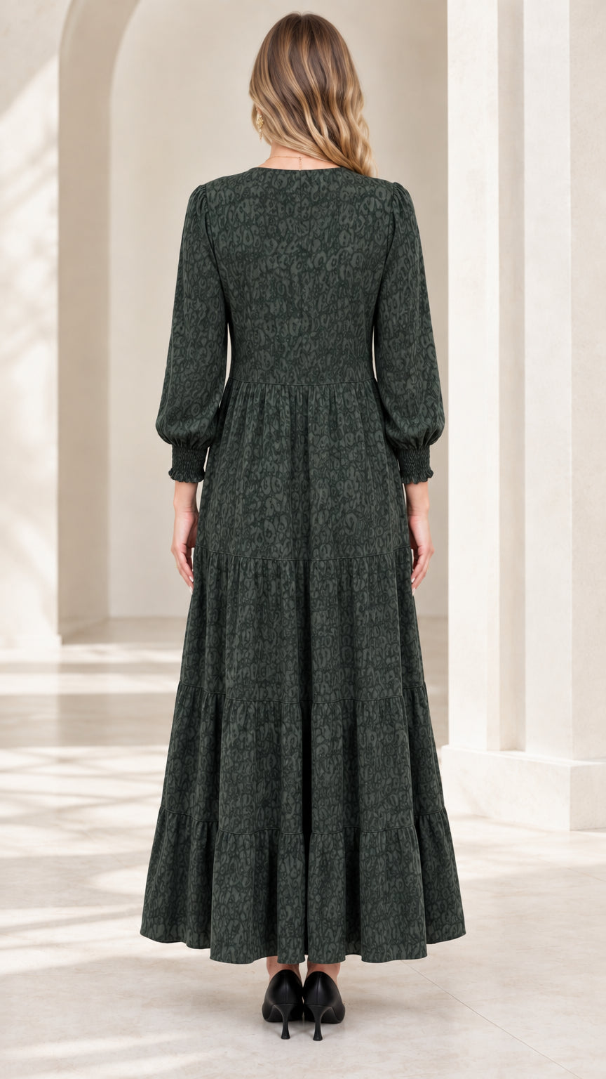Back view of model in dark green jacquard maxi dress