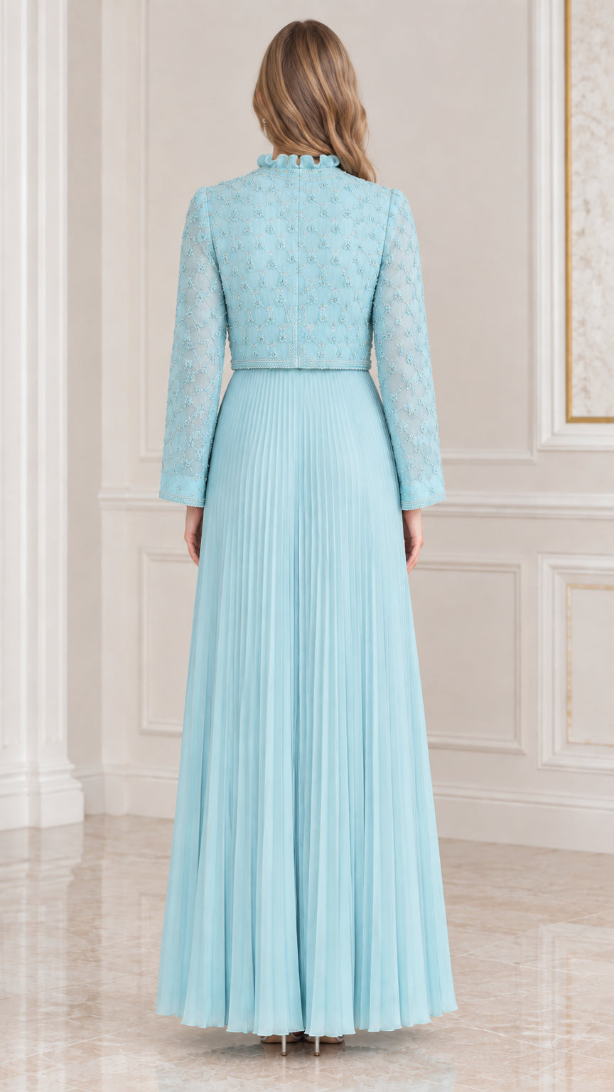 Back view of sky blue formal dress set showing cropped beaded jacket and pleated skirt