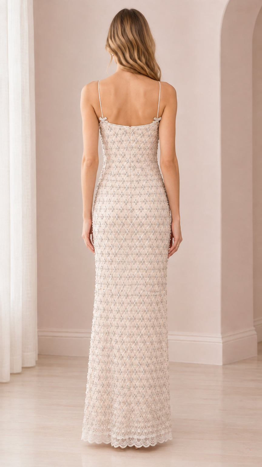 Back view of elegant champagne spaghetti strap beaded maxi dress