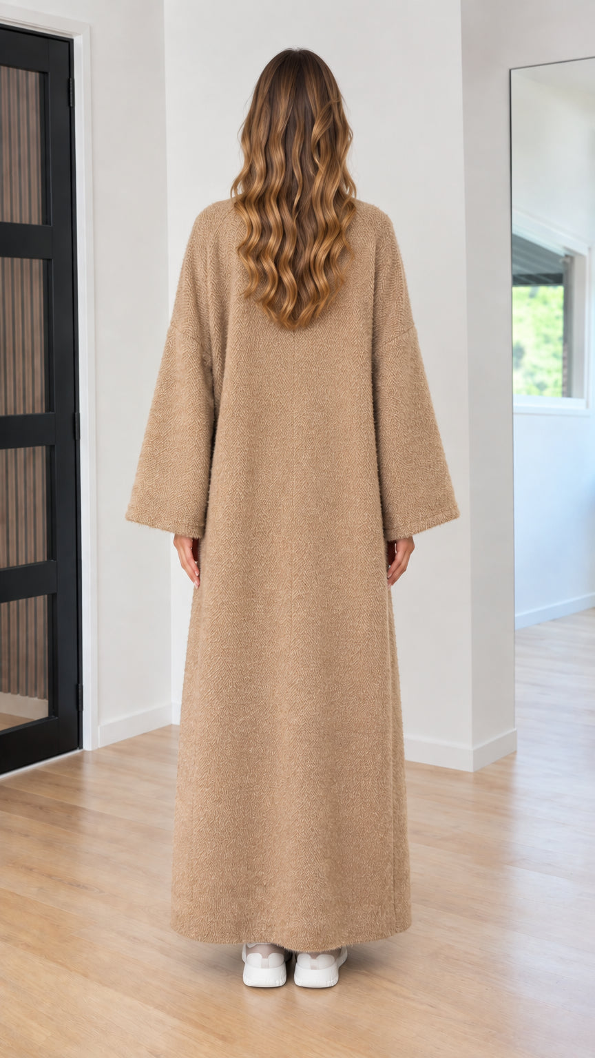 Back view of camel floor-length relaxed knit open cardigan