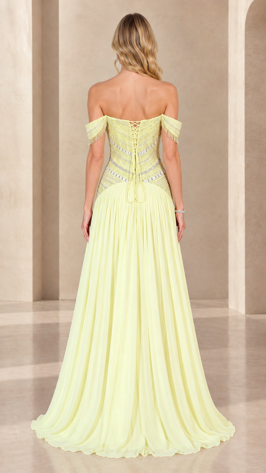 Back view of pastel yellow evening gown highlighting lace-up corset detail