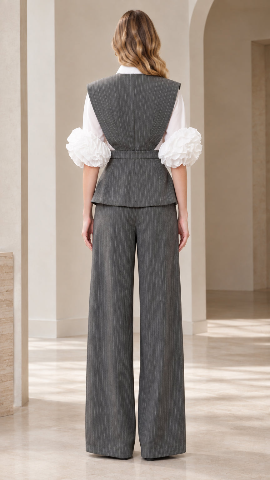 Back view of women's grey pinstripe waistcoat and wide-leg pants