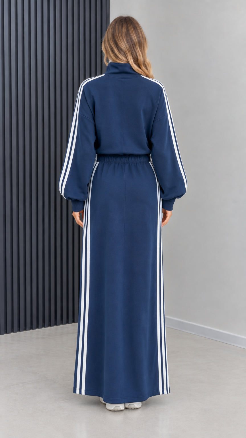 Back view of navy blue long sleeve sporty maxi dress with elastic waist