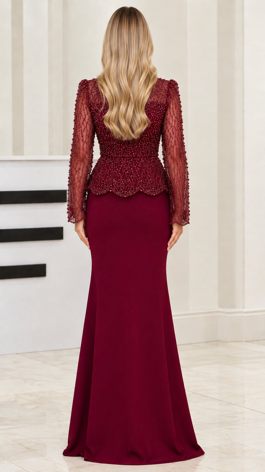 Back view of burgundy long sleeve peplum evening dress